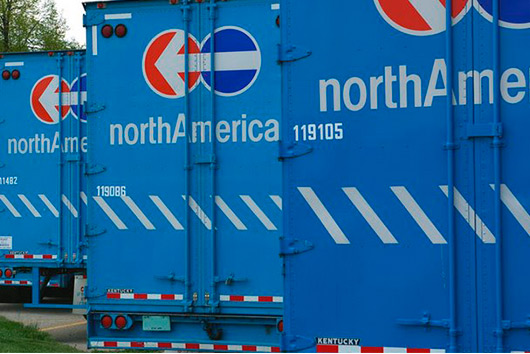 North America movers trucks. Cargo by Oakley relocation. Storage and moving services.